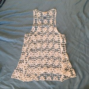 Crochet floral tank top.